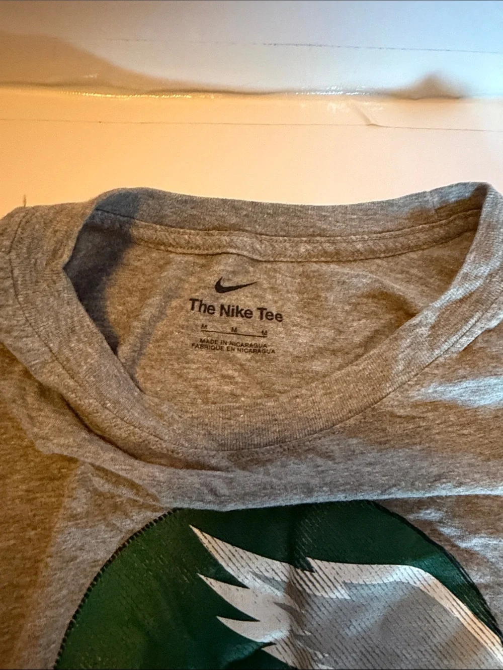 Nike Gray Tee with Green and White Helmet Graphic
